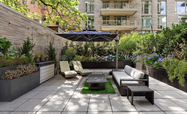 A one-bedroom condo with a 800-square-foot landscaped terrace in Hell's Kitchen